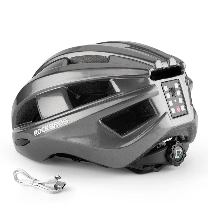 Titanium bicycle helmet with integrated USB rechargeable rear taillight and adjustable straps
