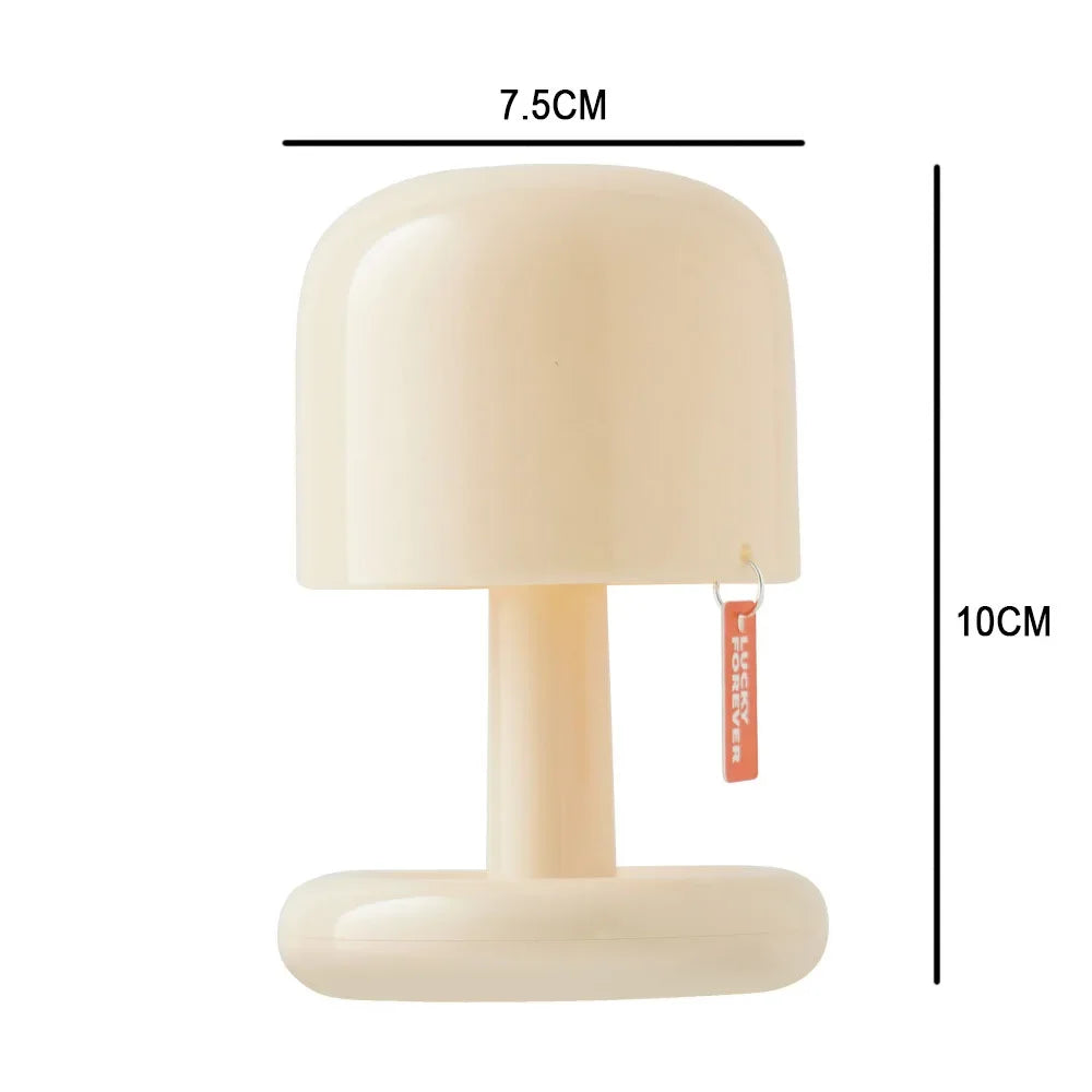 Compact LED mini sunset night light projecting a warm golden glow onto a blank wall — view 5
