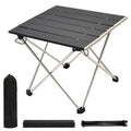Portable aluminum camping table in silver with black folding bracket and black travel storage bag