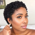 Short afro curly human hair wig in natural black styled as a voluminous pixie cut