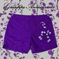 Purple cherry blossom embroidered swim trunks with adjustable drawstring waist and mid-thigh cut