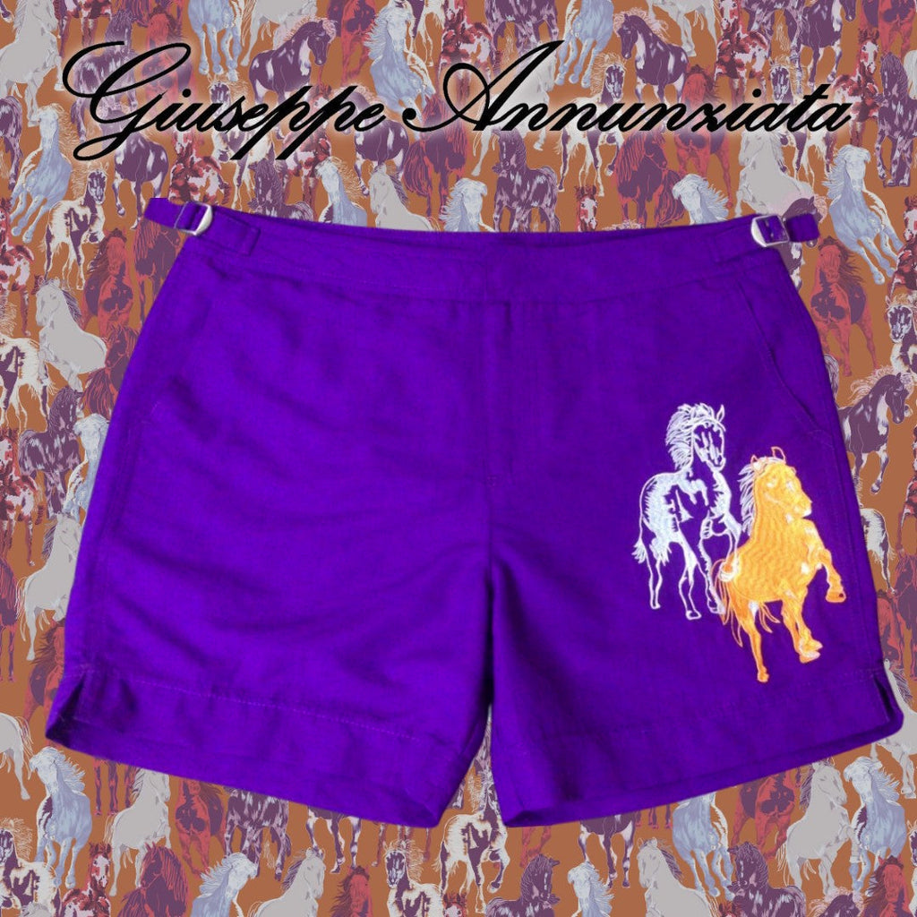 Purple men's swim trunks with hand-embroidered horse motifs, elastic waistband, and adjustable drawstring.