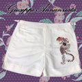 White men's swim shorts featuring hand-embroidered mandala tiger design with elastic drawstring waistband.
