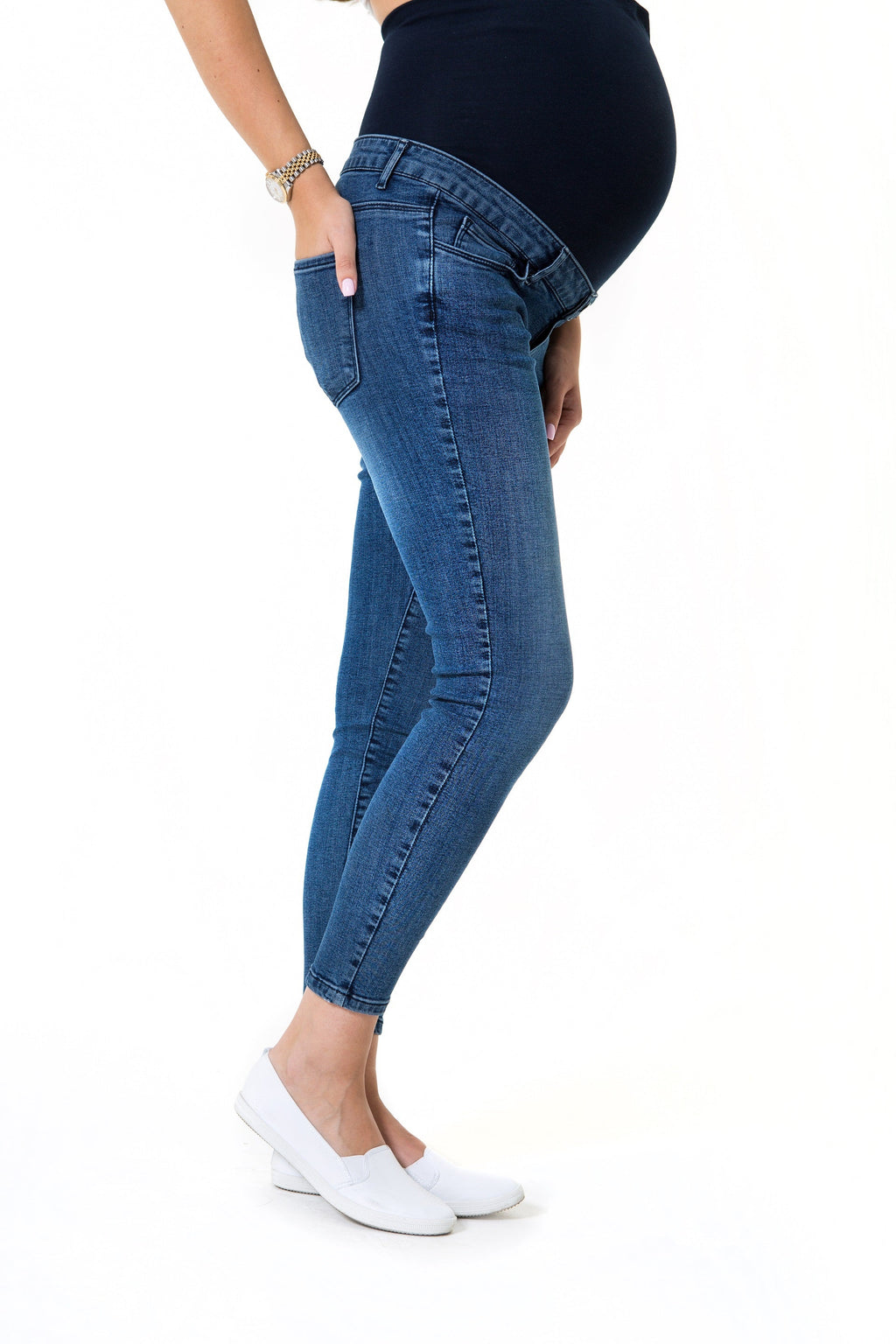 Skinny foldover waistband maternity jeans featuring a stretchy over-the-bump fit for pregnancy comfort — view 3