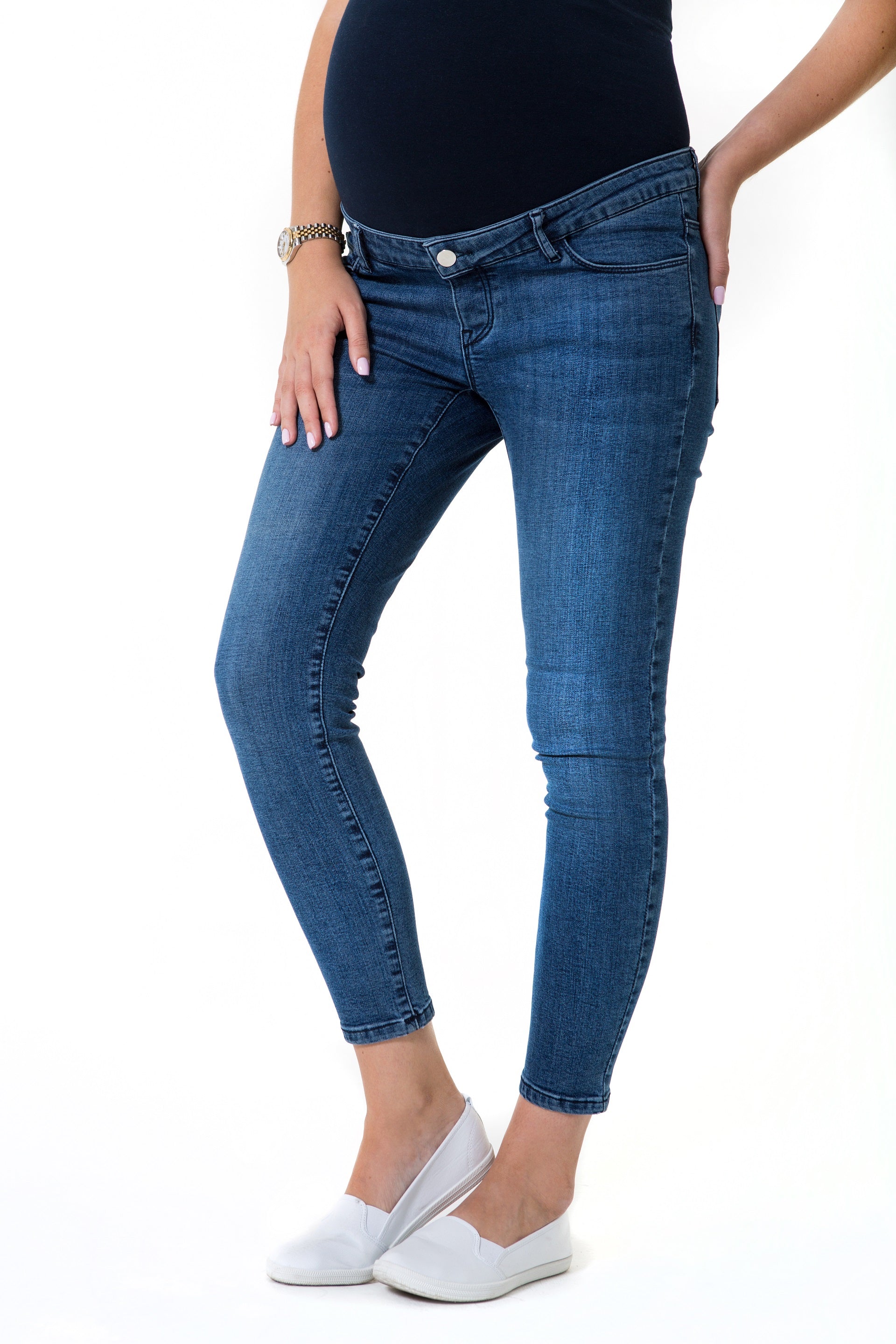 Skinny foldover waistband maternity jeans featuring a stretchy over-the-bump fit for pregnancy comfort — view 4