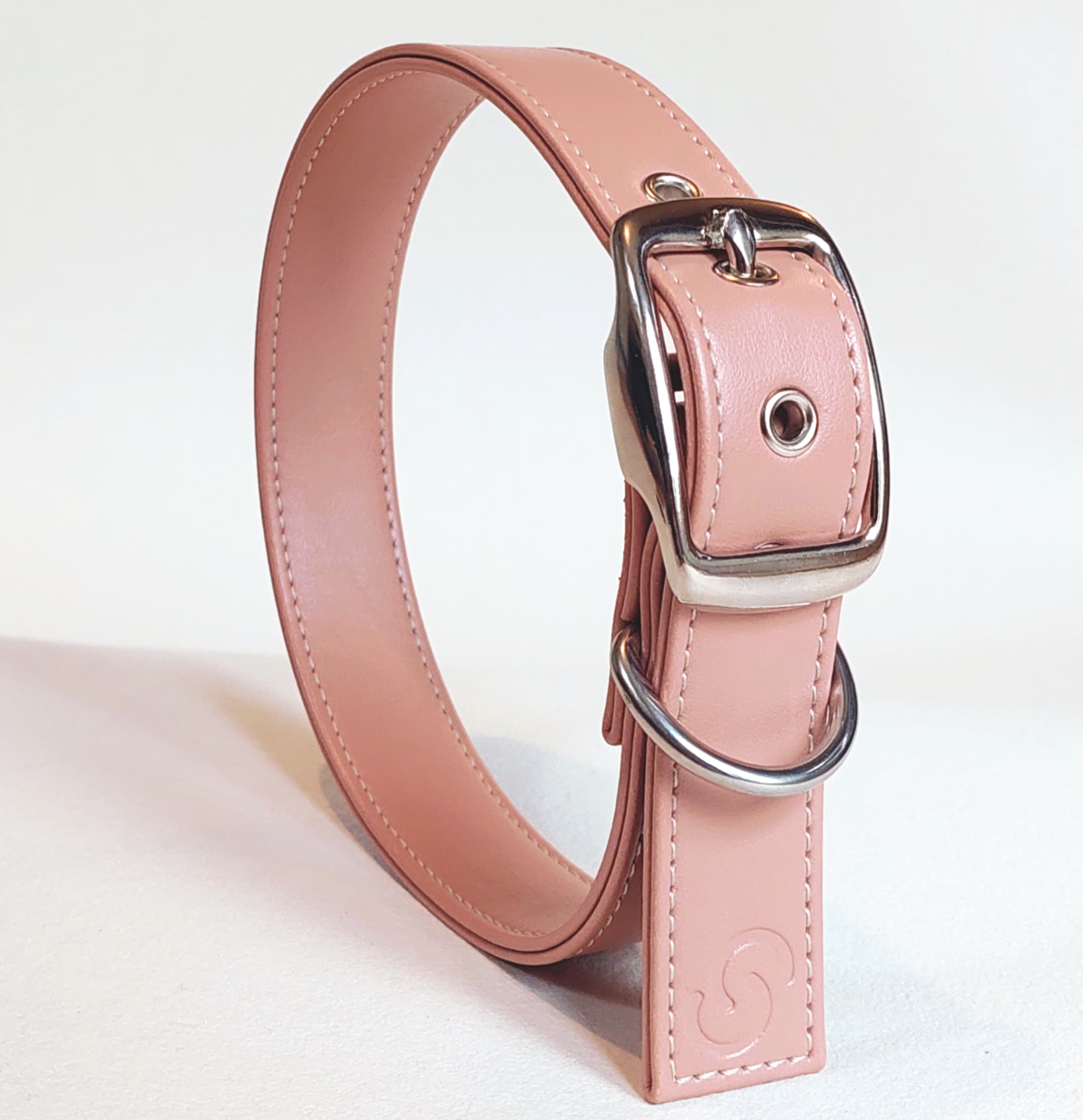 Blush pink vegan apple leather dog collar with metal buckle and adjustable eyelets