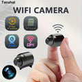 Small wireless security camera in black, compact smart home monitoring device with camera lens
