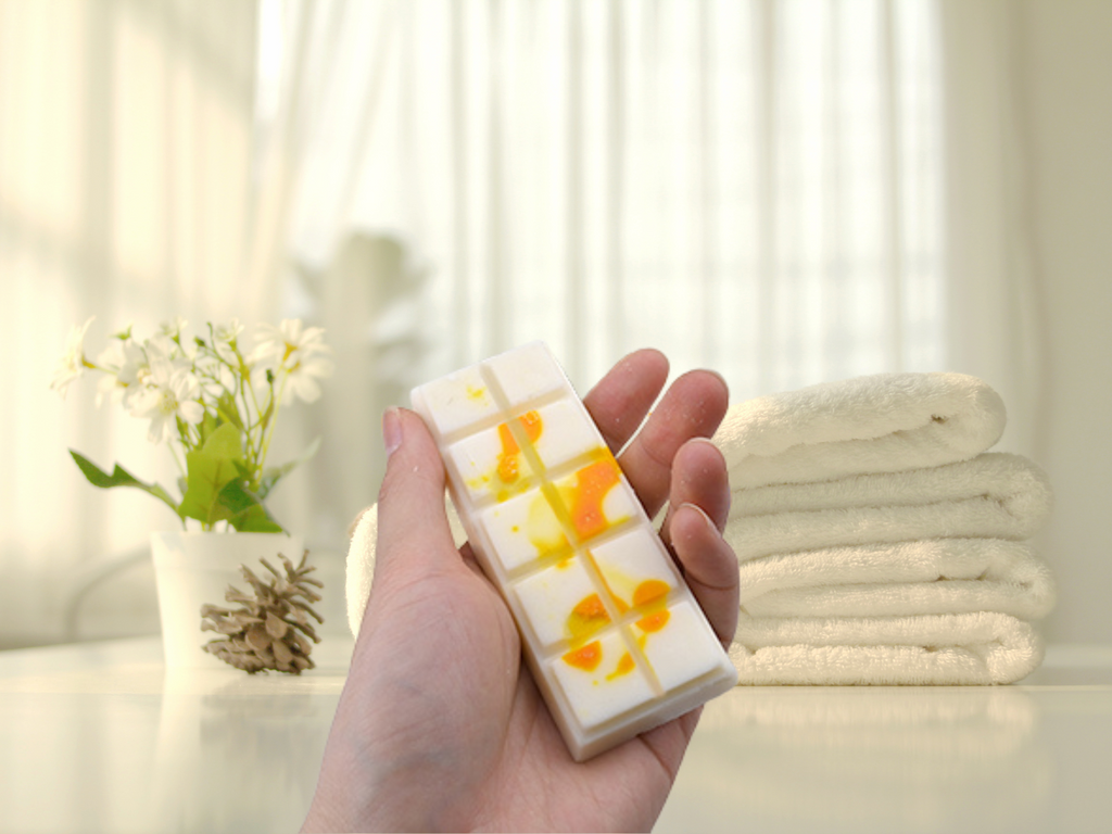 Cozy and comforting artisan soy wax melts bar in warm tones for seasonal home fragrance