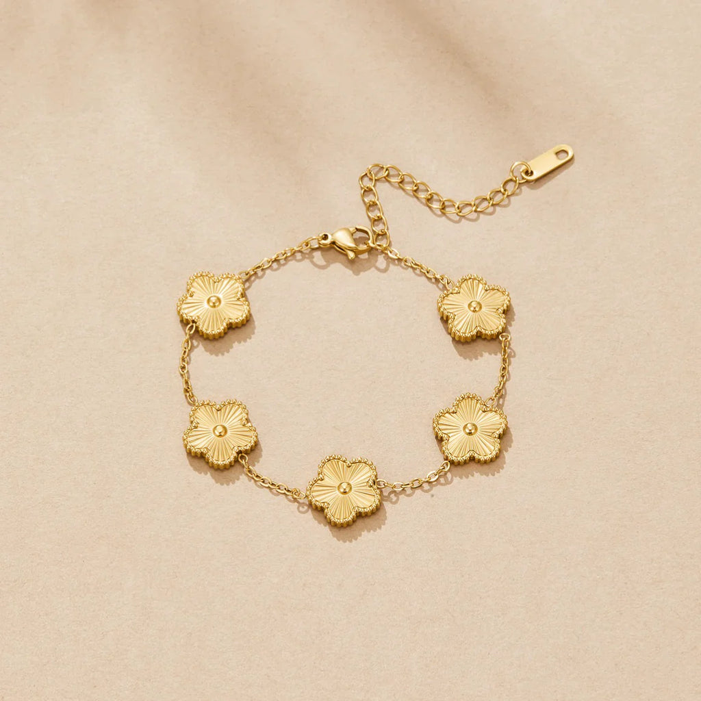 Golden clover flower charm bracelet with a radiant gold finish and delicate adjustable chain — view 5