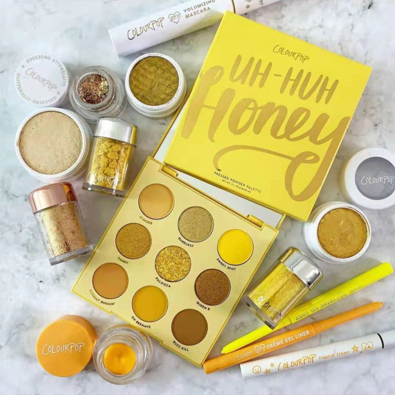 Sparkling honey mineral eye shadow palette featuring shimmering tones in a compact travel-friendly case. — view 2