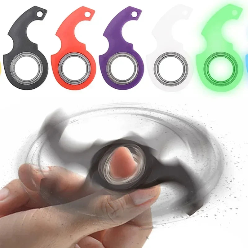 Plastic spinner stress toy keychain fidget ring attached to a metal ring, sensory focus tool — view 4