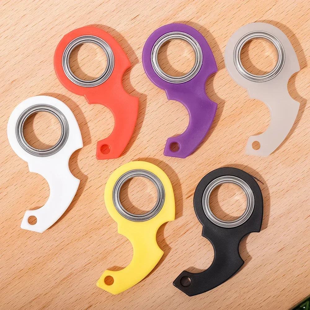 Plastic spinner stress toy keychain fidget ring attached to a metal ring, sensory focus tool — view 5