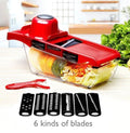 Red stainless steel vegetable slicer featuring six interchangeable blades for efficient kitchen prep