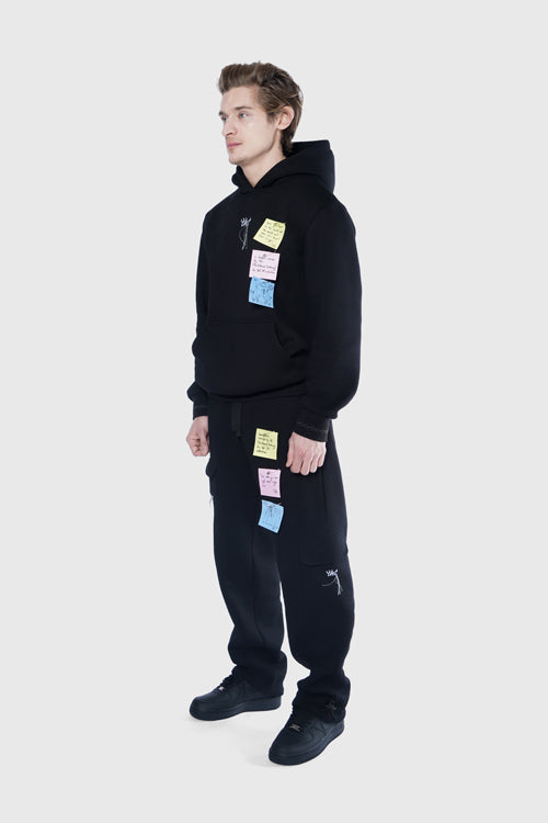 Pullover hoodie featuring customizable removable sticky notes and embroidered loose thread artwork details — view 2