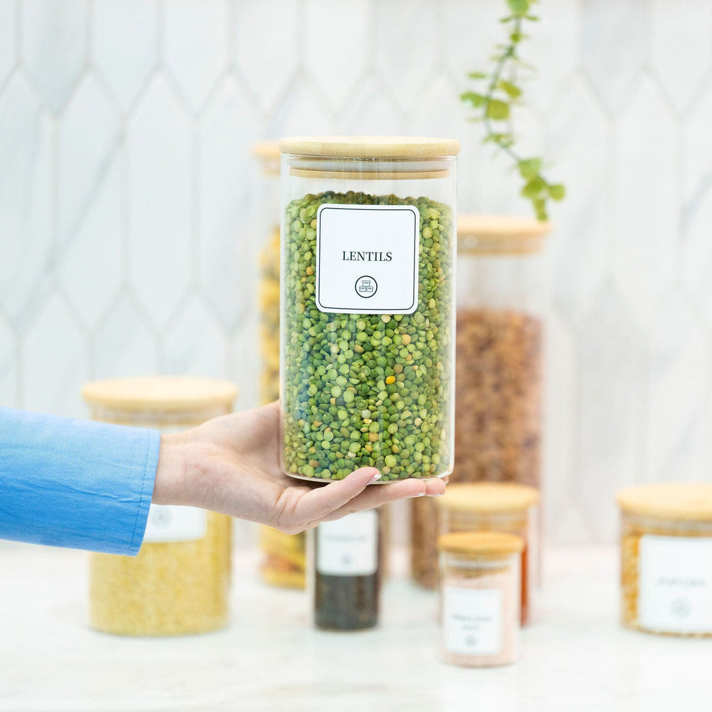 Round clear borosilicate glass storage jar with a natural bamboo airtight lid for pantry organisation. — view 4
