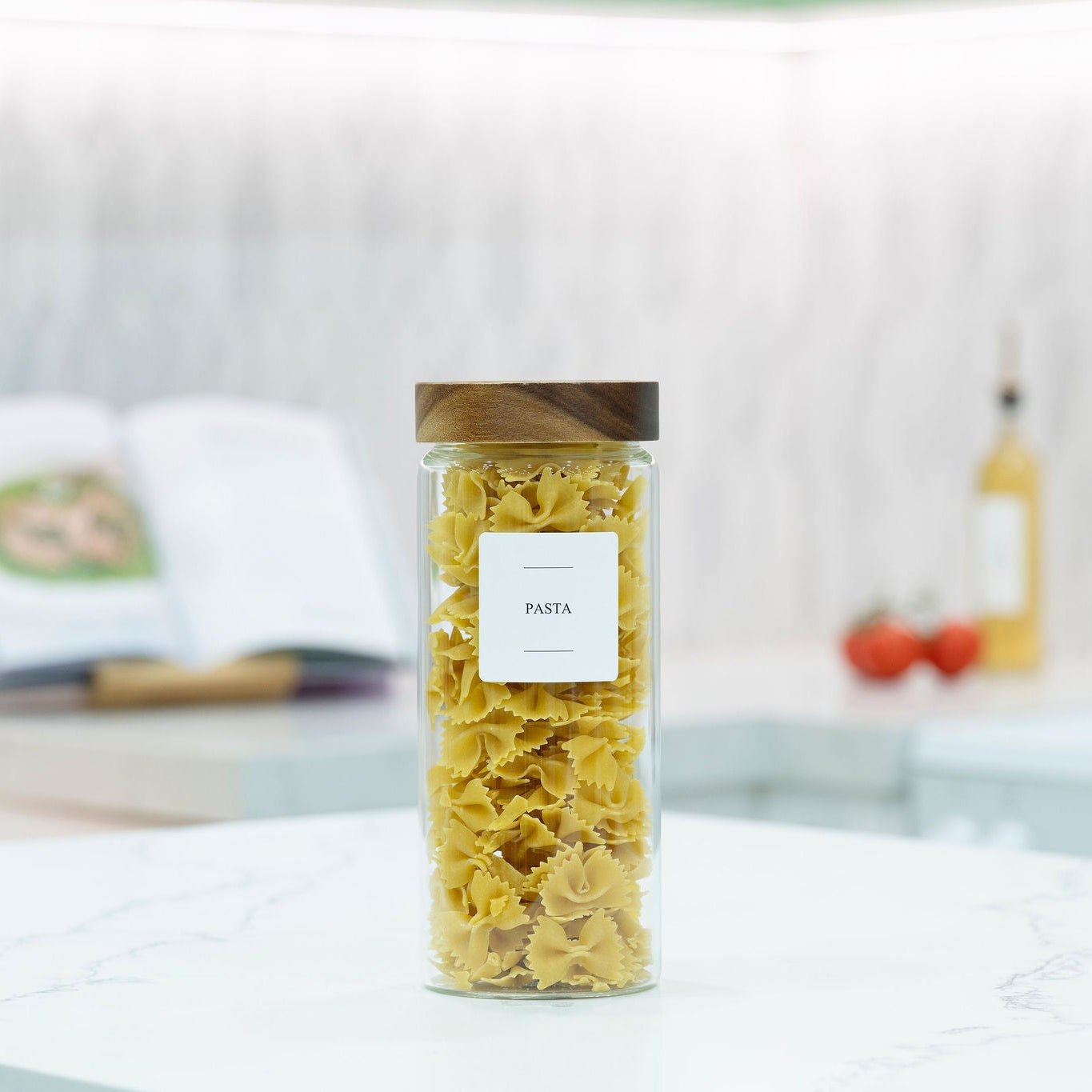 Clear 1750ml borosilicate glass pantry storage jar with a natural acacia wood screw-on lid — view 2