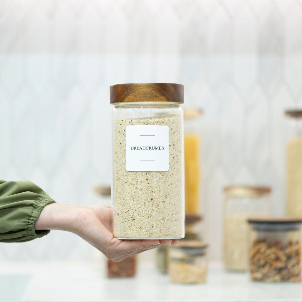 Clear borosilicate glass storage jar with threaded acacia wood screw-on lid for pantry organization — view 3