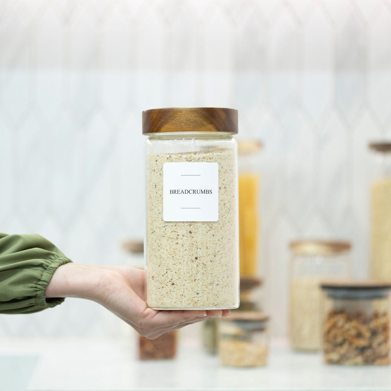 Clear borosilicate glass storage jar with threaded acacia wood screw-on lid for pantry organization — view 3