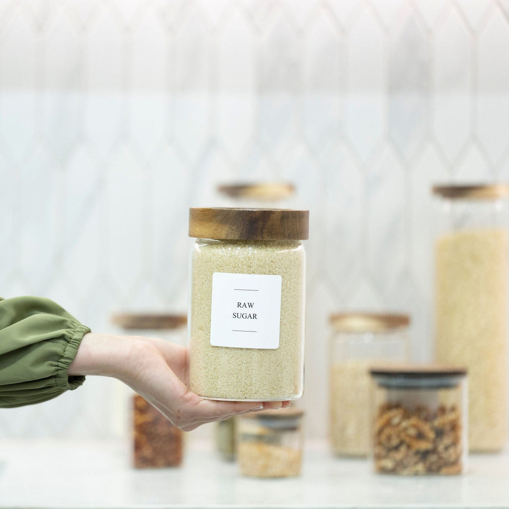 Clear borosilicate glass storage jar with threaded acacia wood screw-on lid for pantry organization — view 4