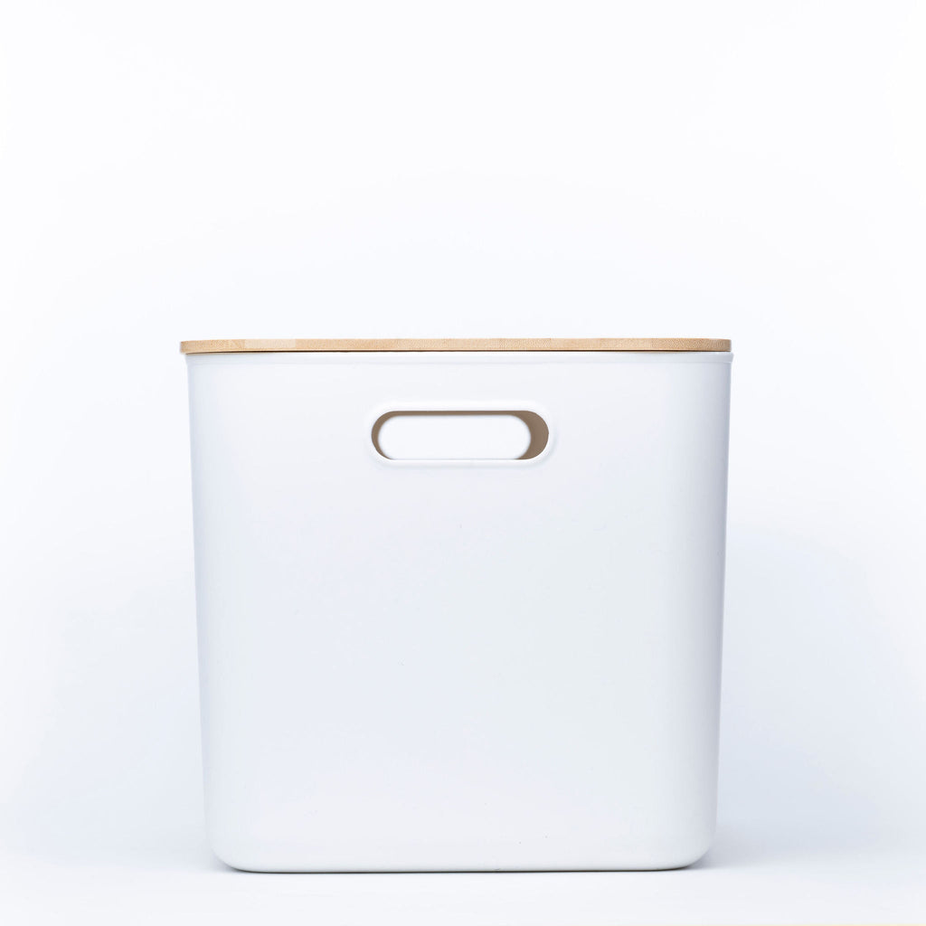 Plastic and bamboo storage container in off-white with natural wood lid and side handles — view 2