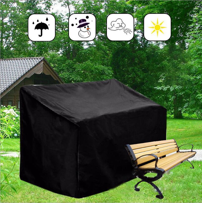 Black and silver waterproof outdoor bench cover over a three seater patio bench