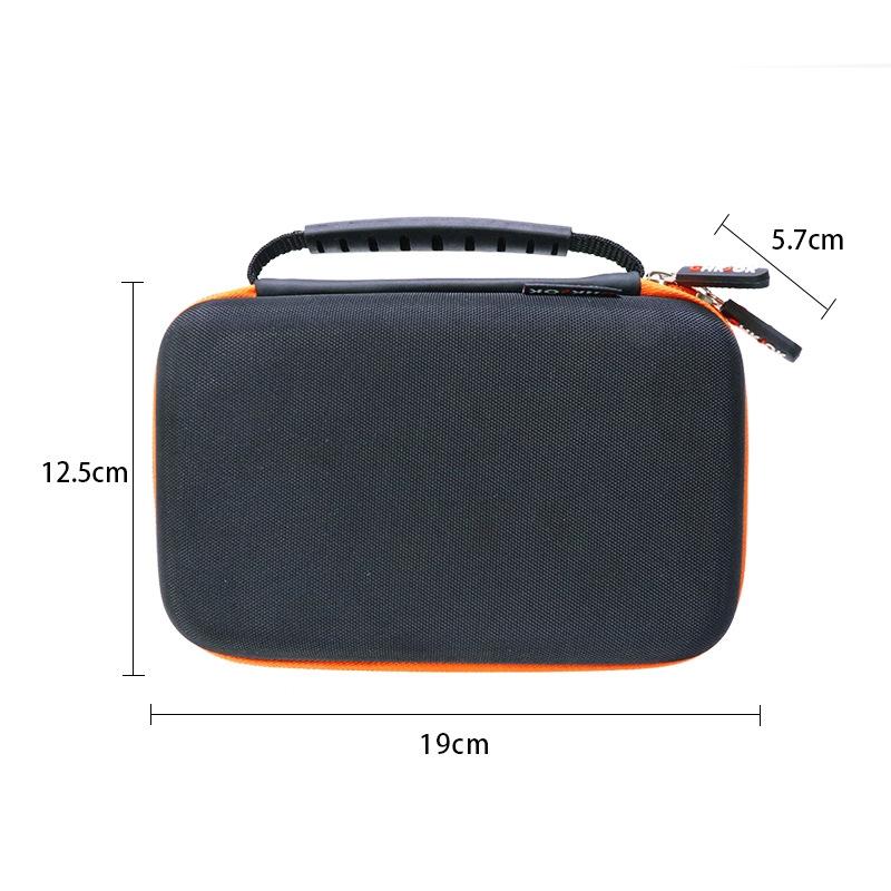 Portable black nylon game console storage bag with zipper and internal mesh card slots — view 2