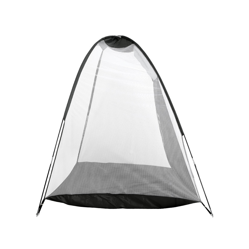 Black golf practice net with fiberglass frame and large bullseye target set up on grass outdoors — view 4