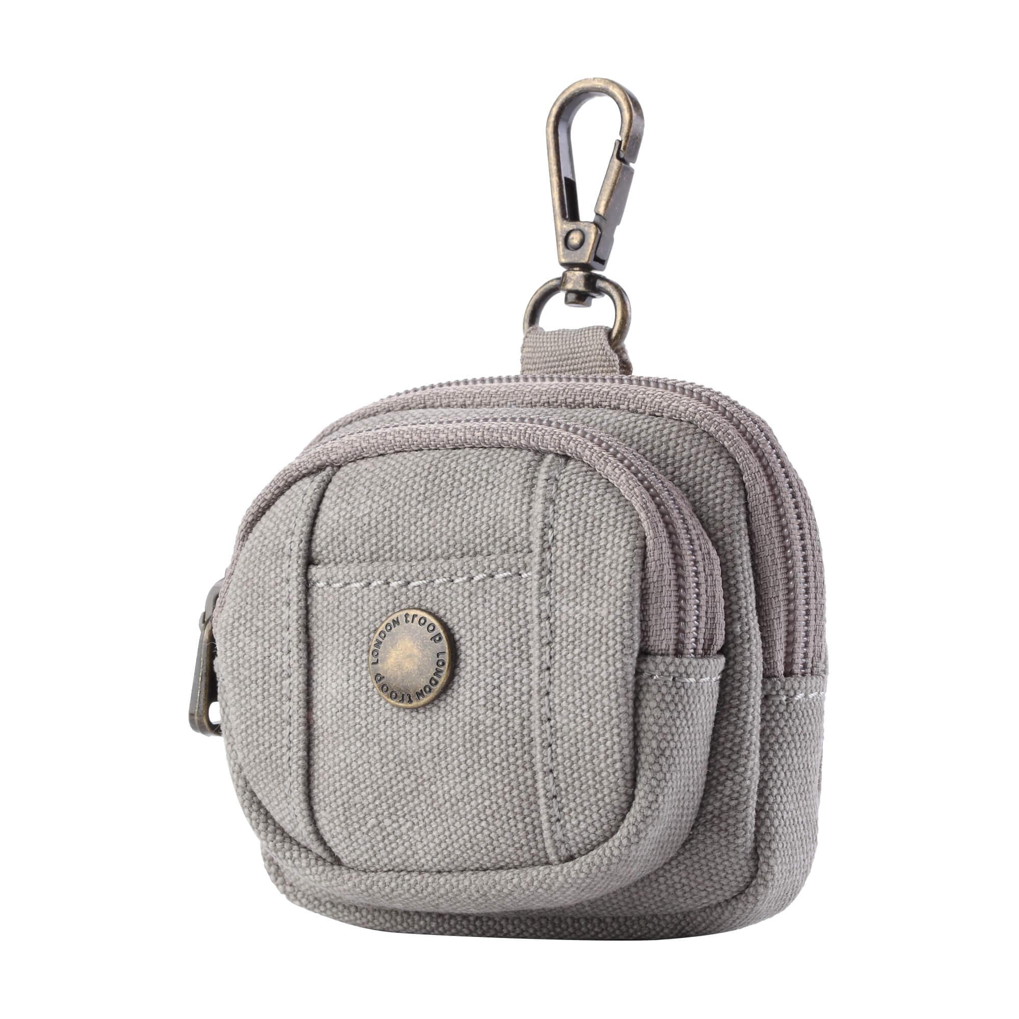 Miniature stonewashed canvas bag charm with dual zippers acting as a coin purse or AirPods case — view 4