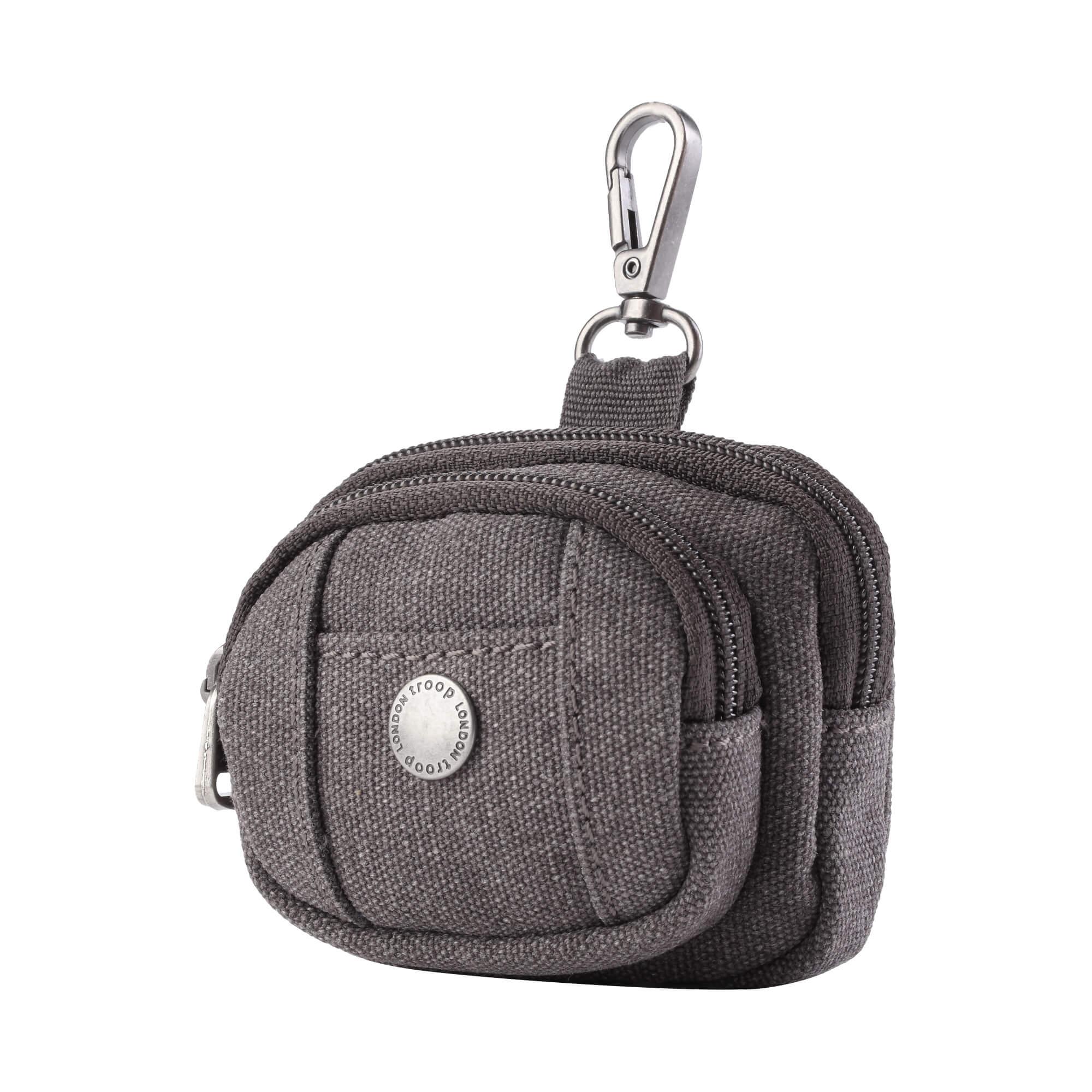 Miniature stonewashed canvas bag charm with dual zippers acting as a coin purse or AirPods case — view 3
