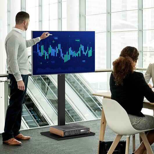 Black metal height adjustable floor TV stand with an AV shelf for flat screens. — view 2