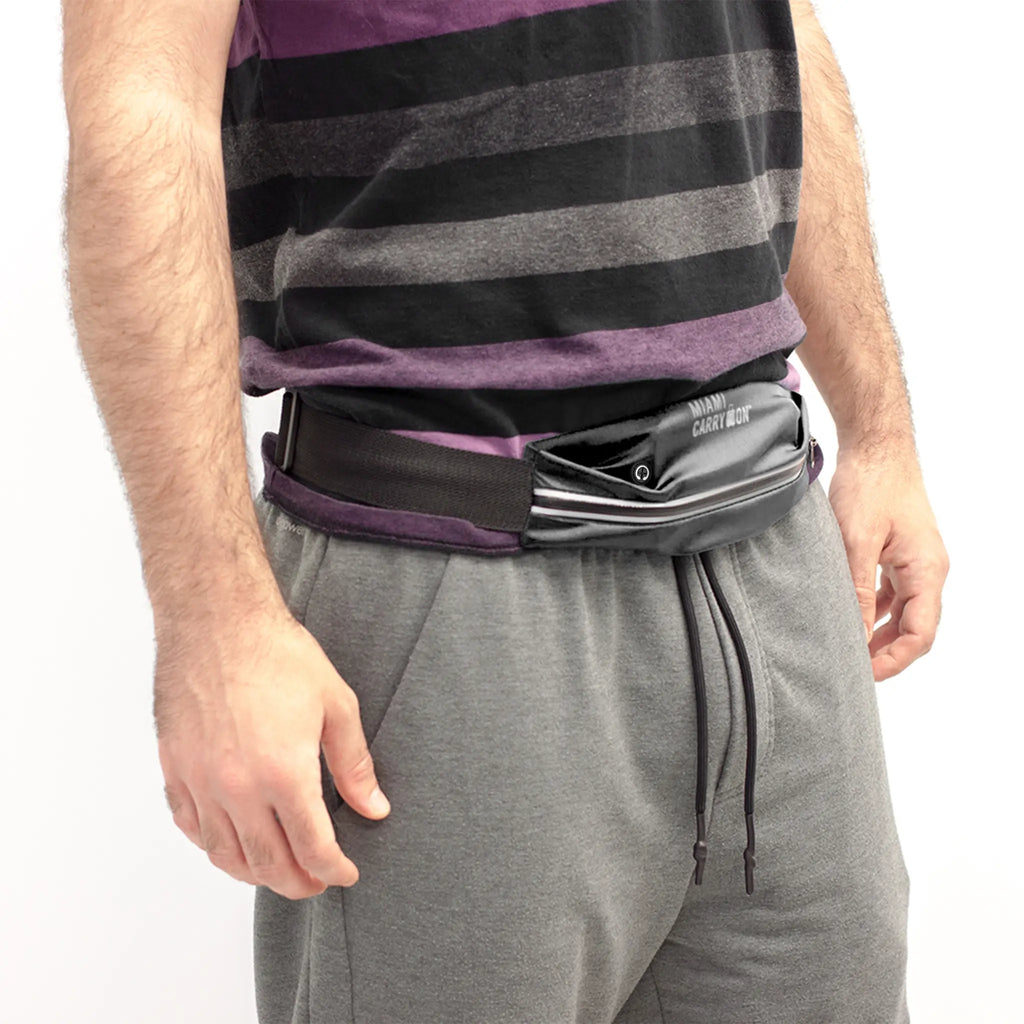 Water-resistant black Lycra workout belt bag with adjustable strap and reflective safety strip — view 2