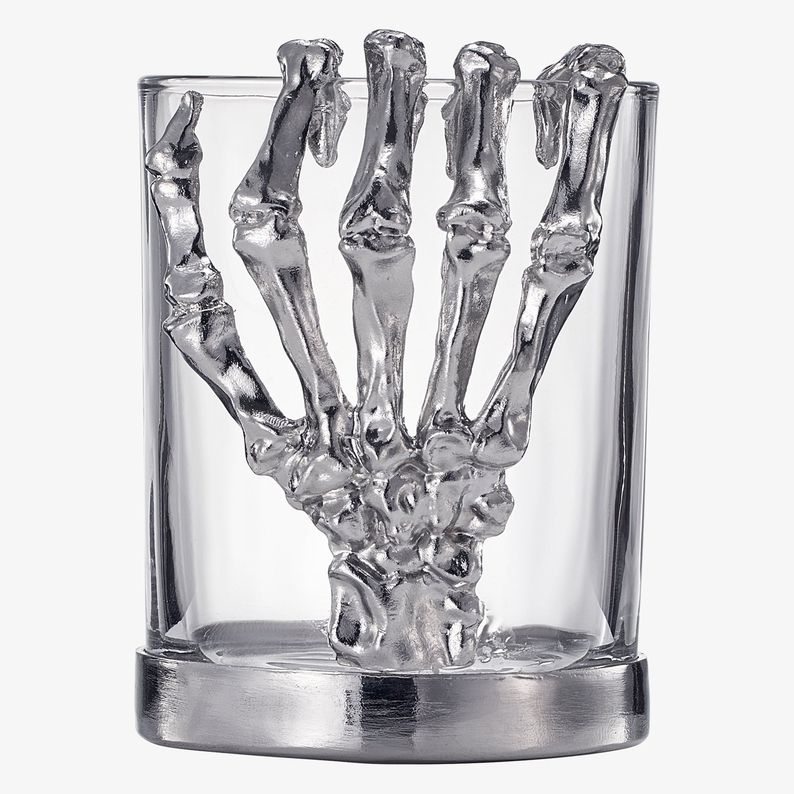 Skeleton whiskey glass tumbler with detailed bone hand stem, clear glass cup holding amber liquor — view 5
