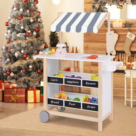 Red wooden kids ice cream cart toy with handle, wheels, chalkboard, and display shelves. — view 6