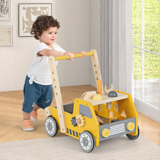 Yellow 2-in-1 wooden baby walker and truck-shaped tool bench toy with bottom storage and rubber wheels — view 2