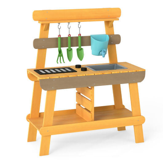 Yellow wooden outdoor mud kitchen for kids with play sink, grill, and gardening tools. — view 5
