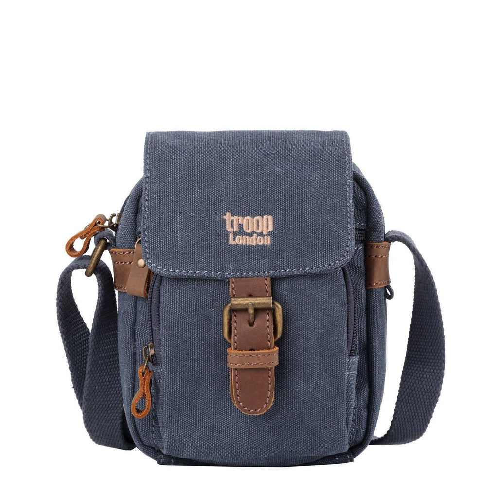 Mini canvas crossbody travel bag with adjustable strap and leather trimmed front buckle detail — view 3