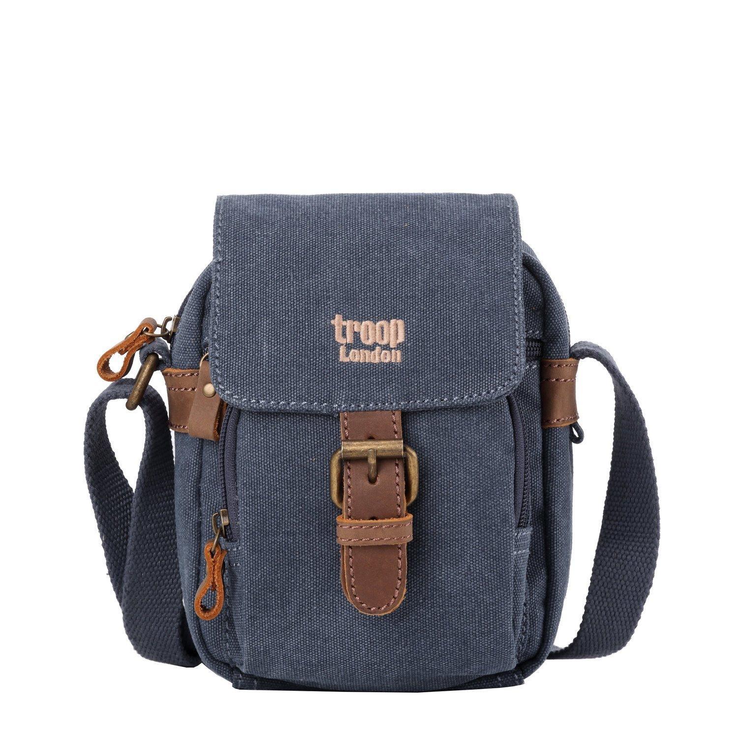 Mini canvas crossbody travel bag with adjustable strap and leather trimmed front buckle detail — view 3