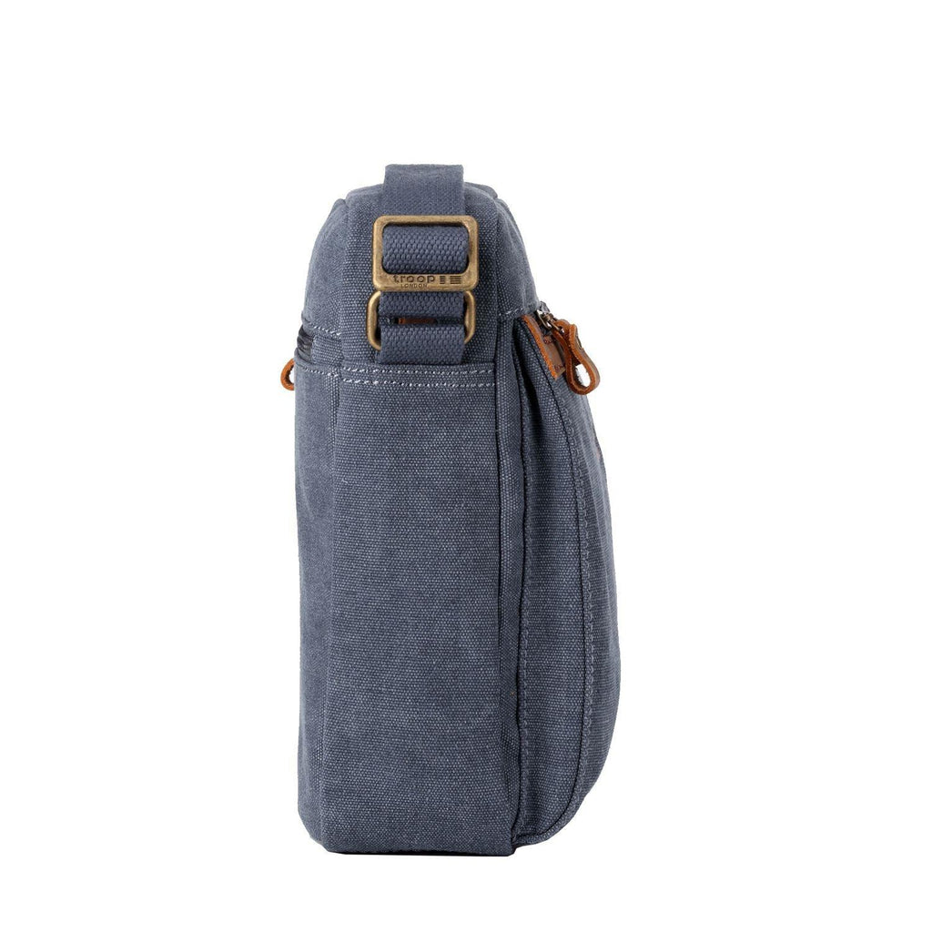 Classic stonewashed canvas crossbody bag with adjustable shoulder strap, brass buckles, and multiple zip pockets. — view 4