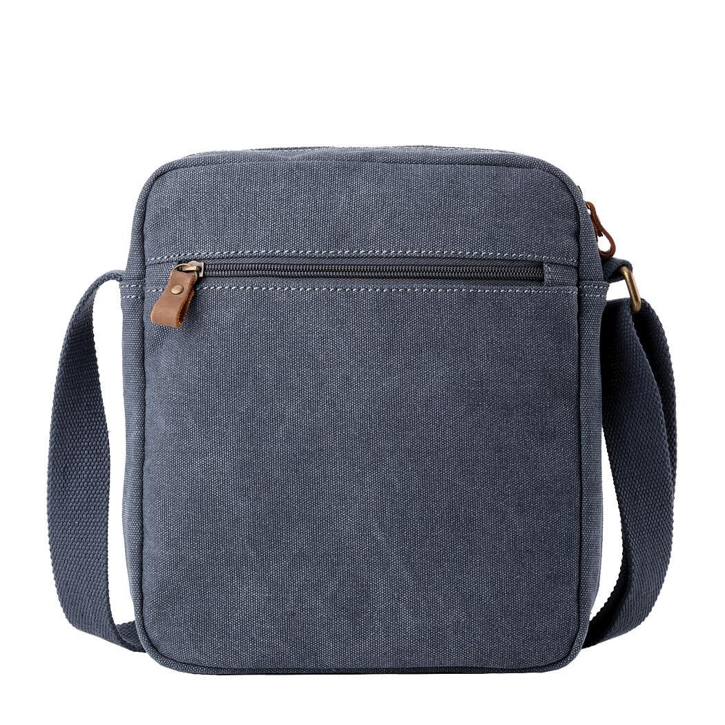 Classic stonewashed canvas crossbody bag with adjustable shoulder strap, brass buckles, and multiple zip pockets. — view 3