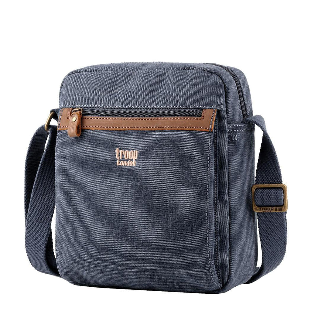 Classic stonewashed canvas crossbody bag with adjustable shoulder strap, brass buckles, and multiple zip pockets. — view 2