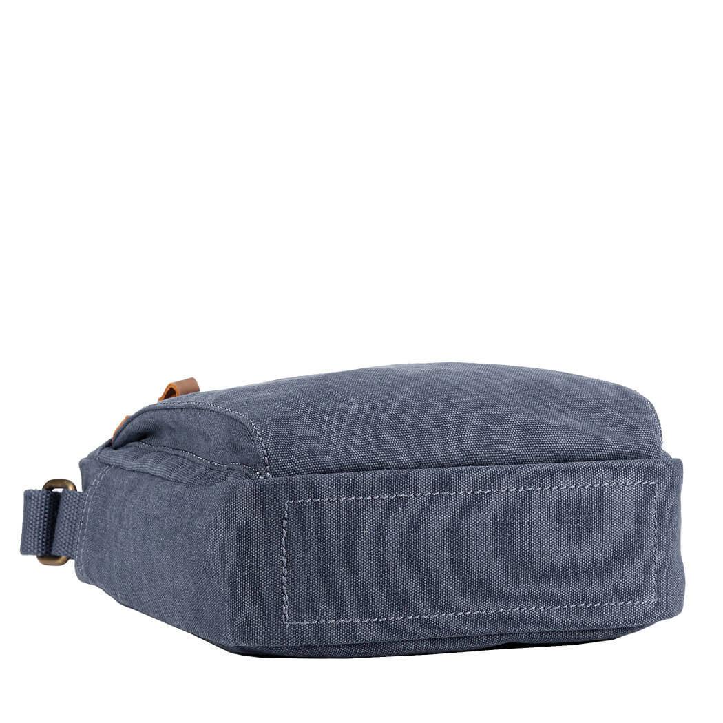 Classic stonewashed canvas crossbody bag with adjustable shoulder strap, brass buckles, and multiple zip pockets. — view 5