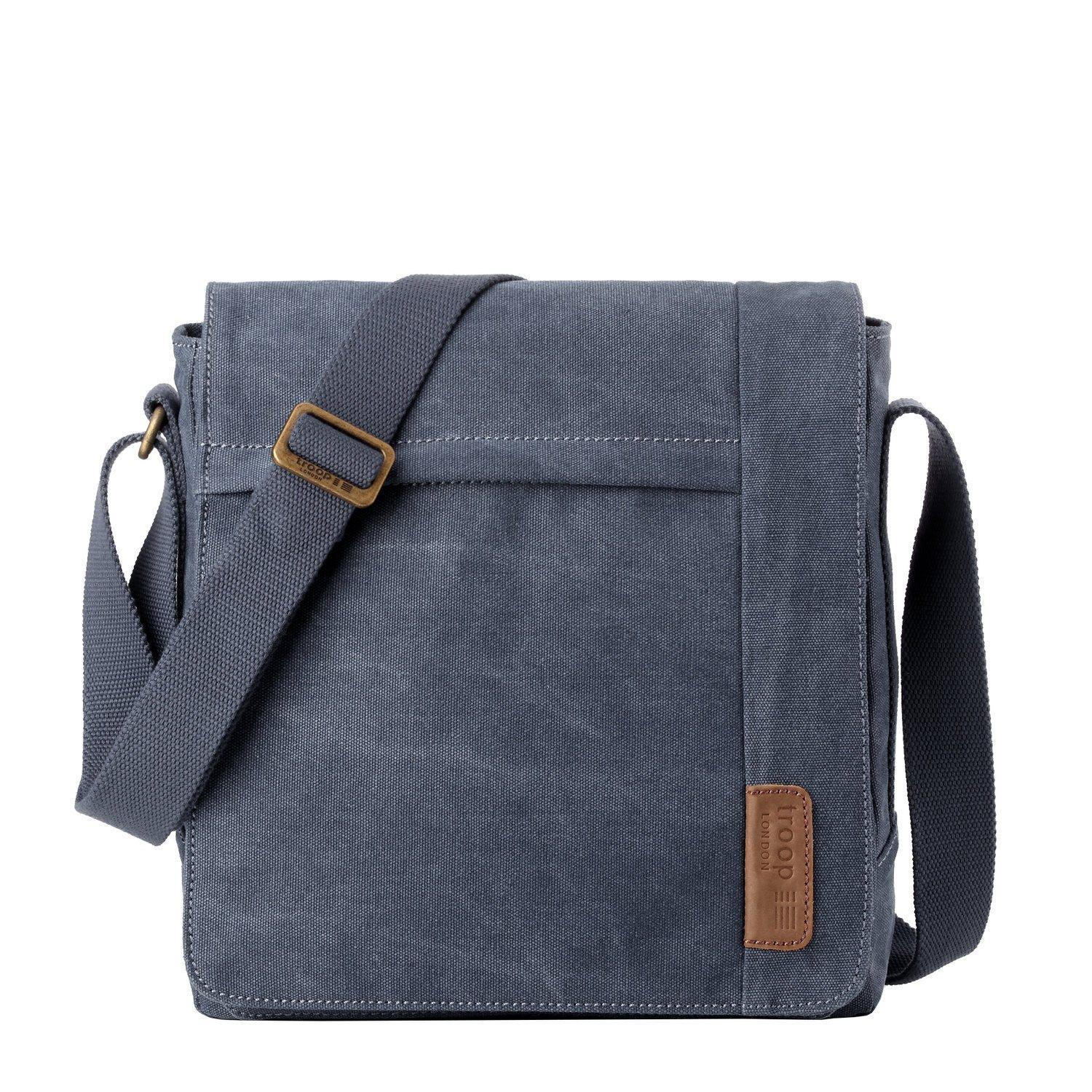 Large canvas flap crossbody bag in stonewashed material with brass buckles and adjustable shoulder strap