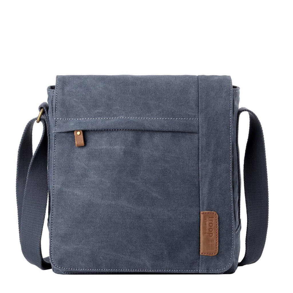 Large canvas flap crossbody bag in stonewashed material with brass buckles and adjustable shoulder strap — view 2