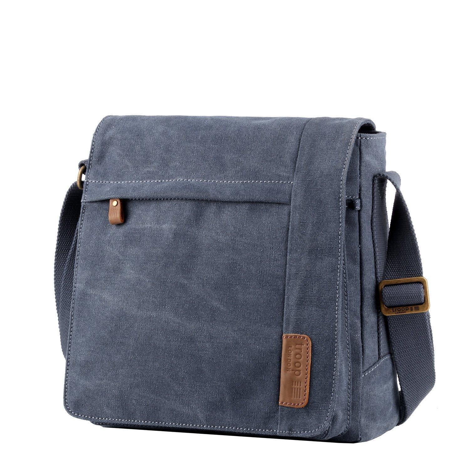 Large canvas flap crossbody bag in stonewashed material with brass buckles and adjustable shoulder strap — view 3