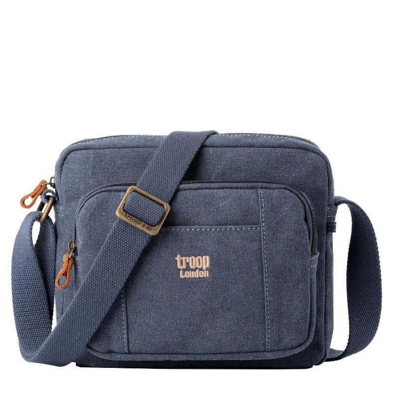 Small stonewashed canvas crossbody bag with genuine leather trimmings and adjustable shoulder strap