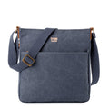 Large stonewashed canvas crossbody bag with genuine leather trim and adjustable shoulder strap