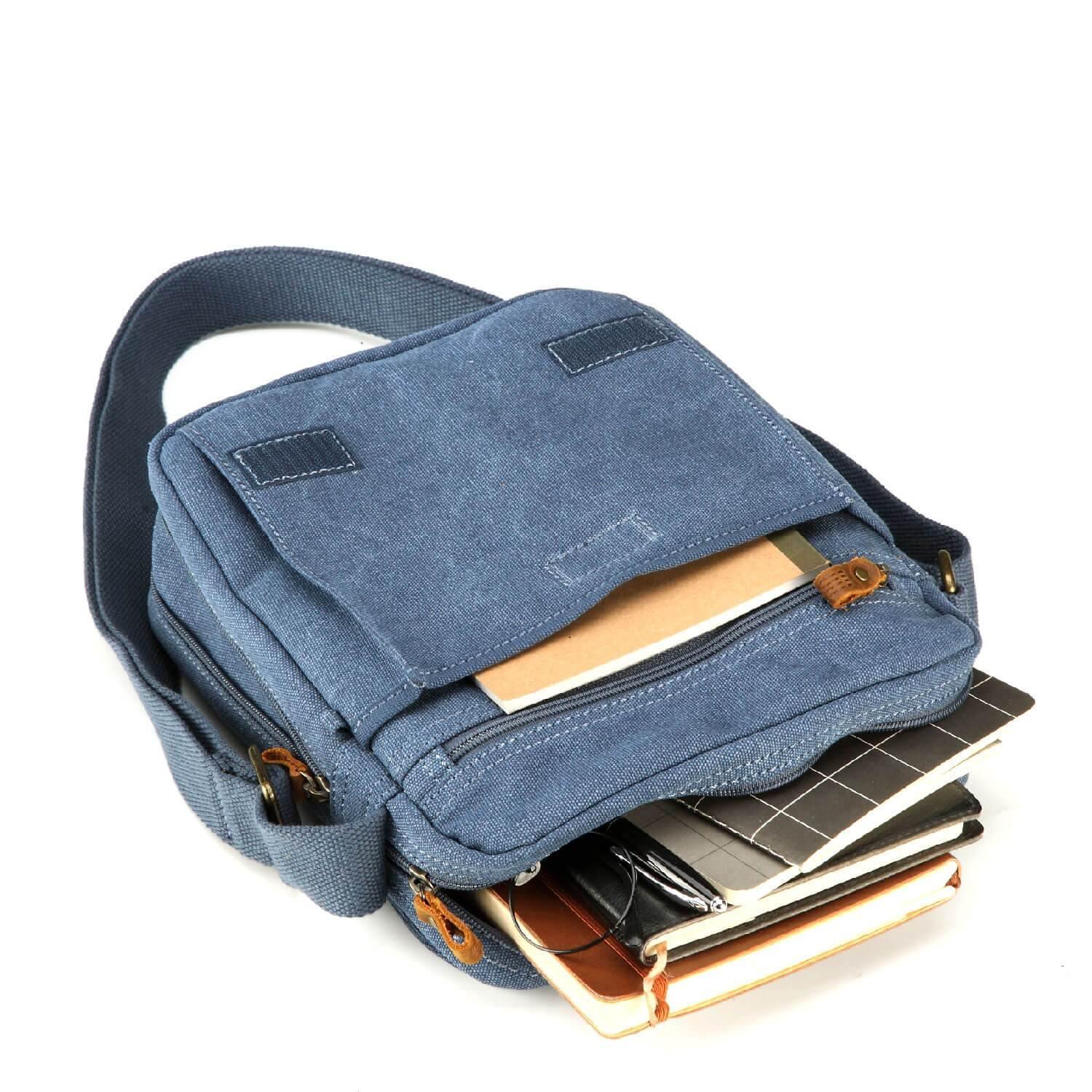 Compact stonewashed canvas crossbody bag with built-in organiser, genuine leather trim, and adjustable shoulder strap — view 5