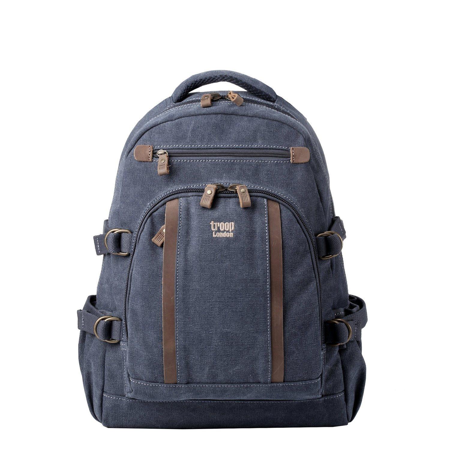 Large stonewashed canvas laptop backpack with leather trimmings, brass hardware, and padded shoulder straps.