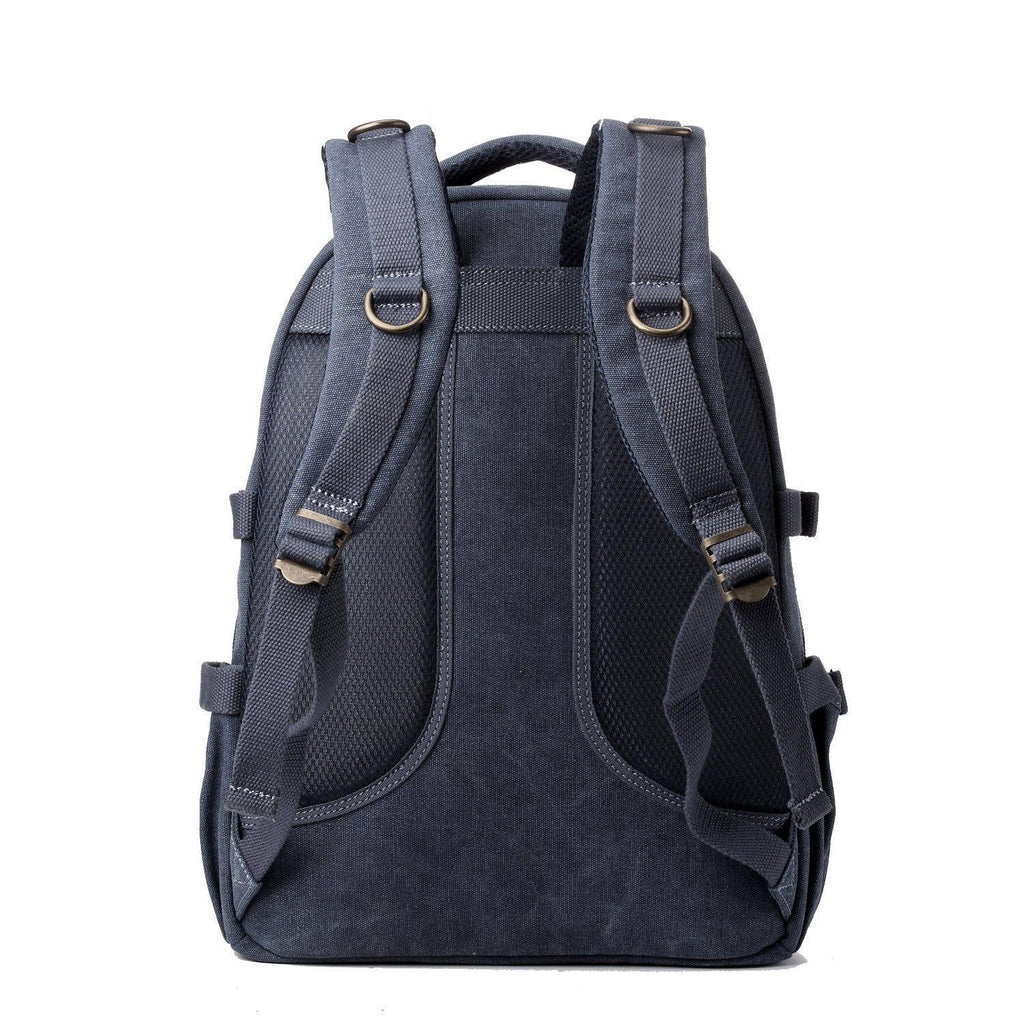 Large stonewashed canvas laptop backpack with leather trimmings, brass hardware, and padded shoulder straps. — view 3