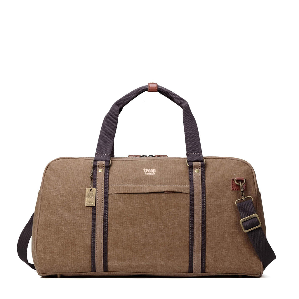 Medium stonewashed canvas travel duffel bag with genuine leather trimmings and brass-plated buckles